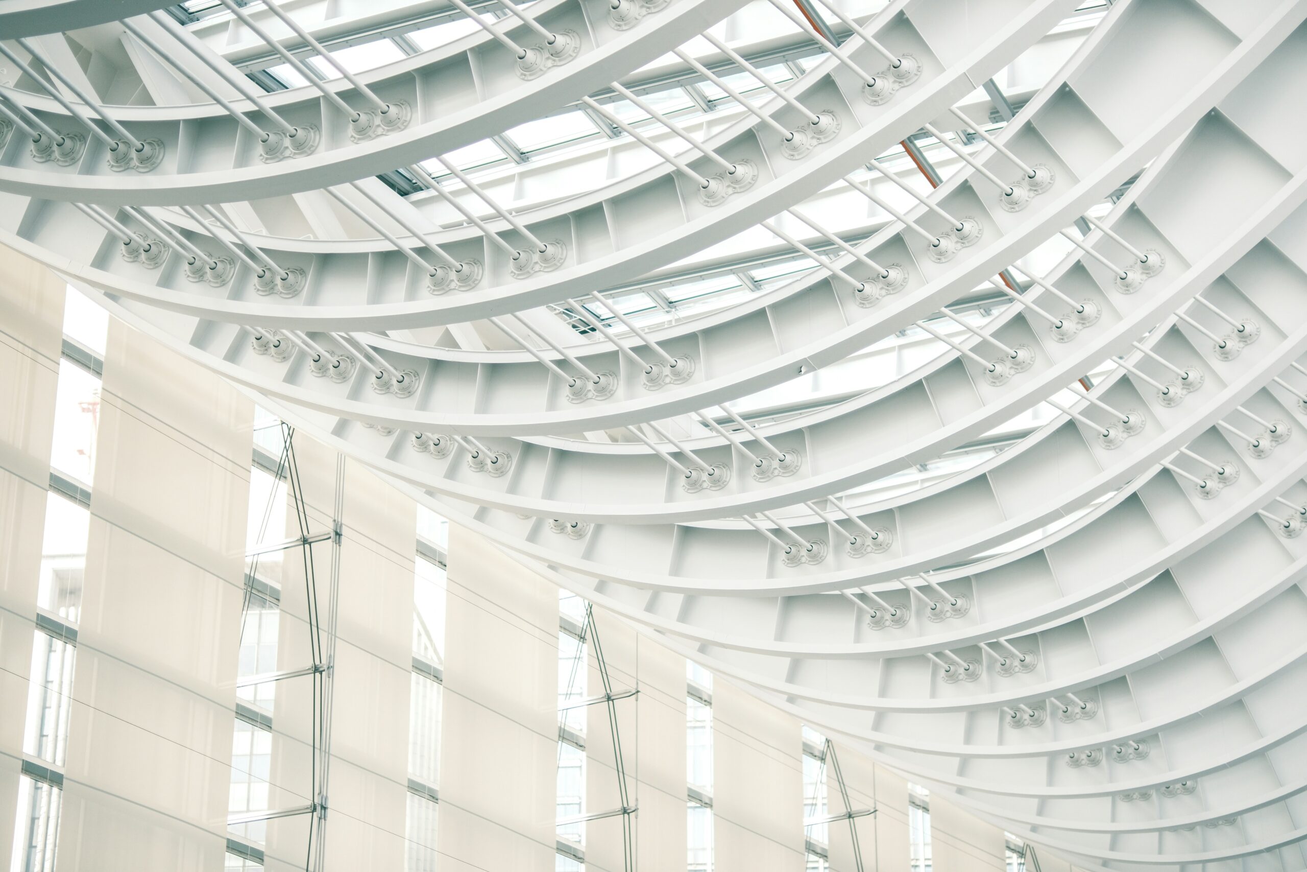 Runway model in an off-white lace dress