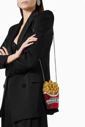 Judith Leiber French Fries clutch on model