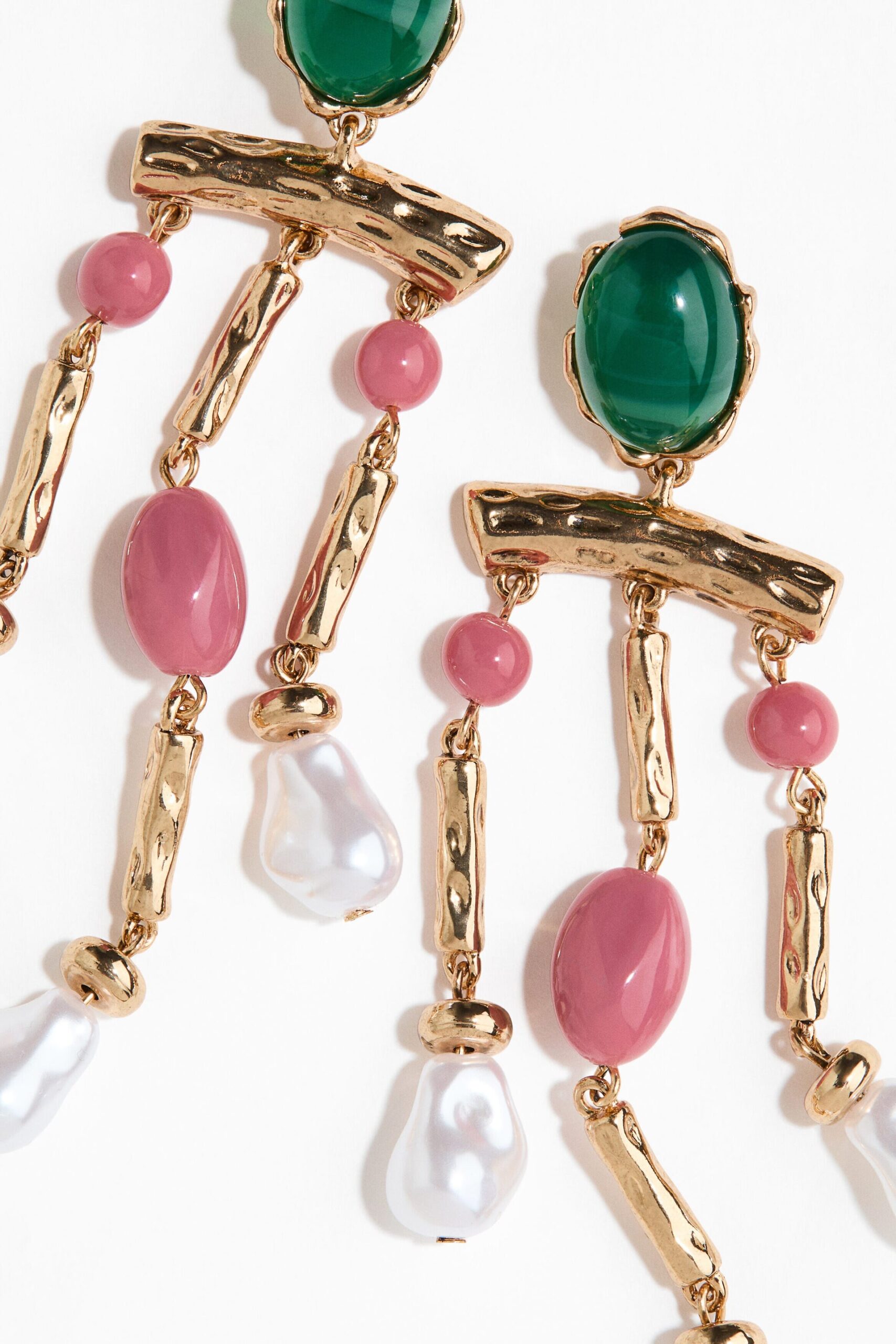 Gold-coloured and green dangle earrings AED 85