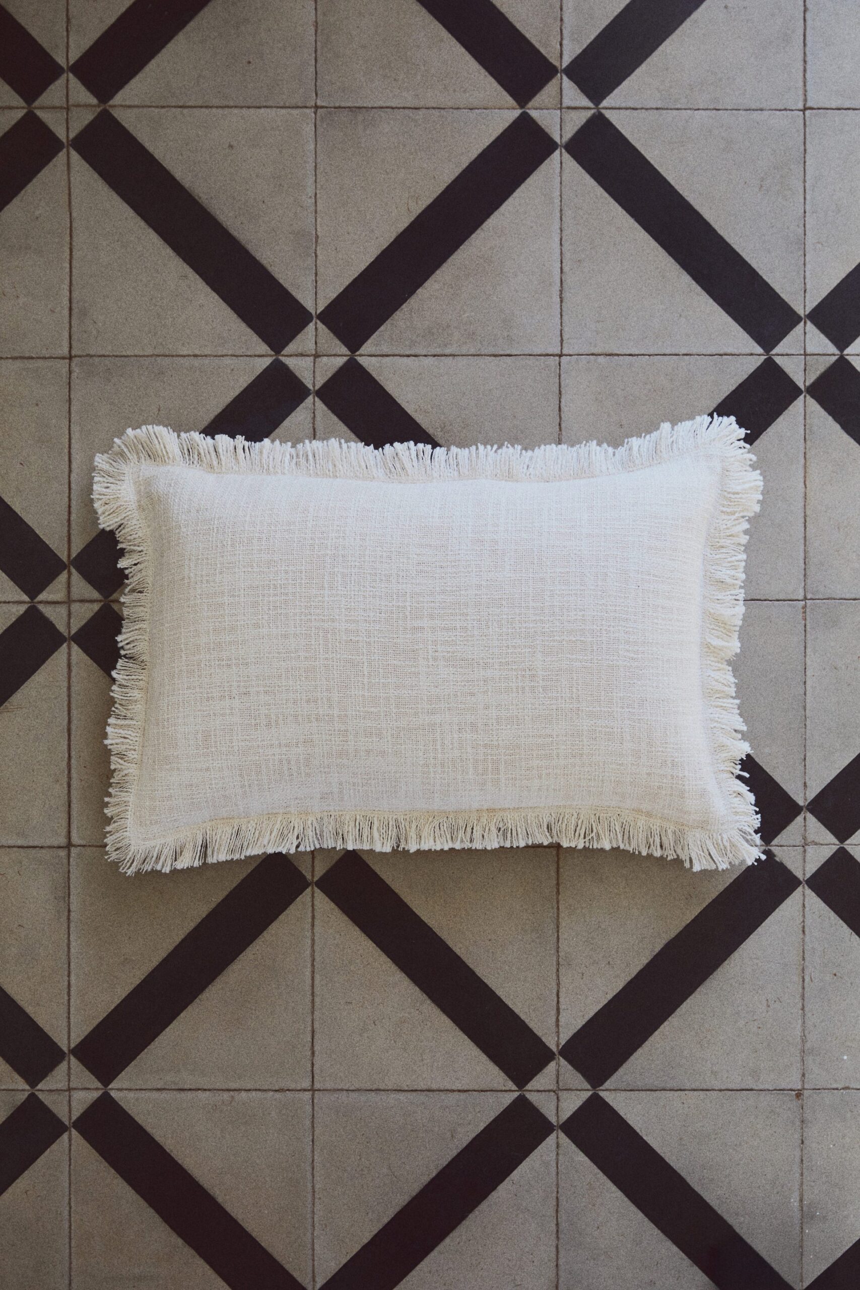 Light beige slub weave cushion cover H&M AED 59