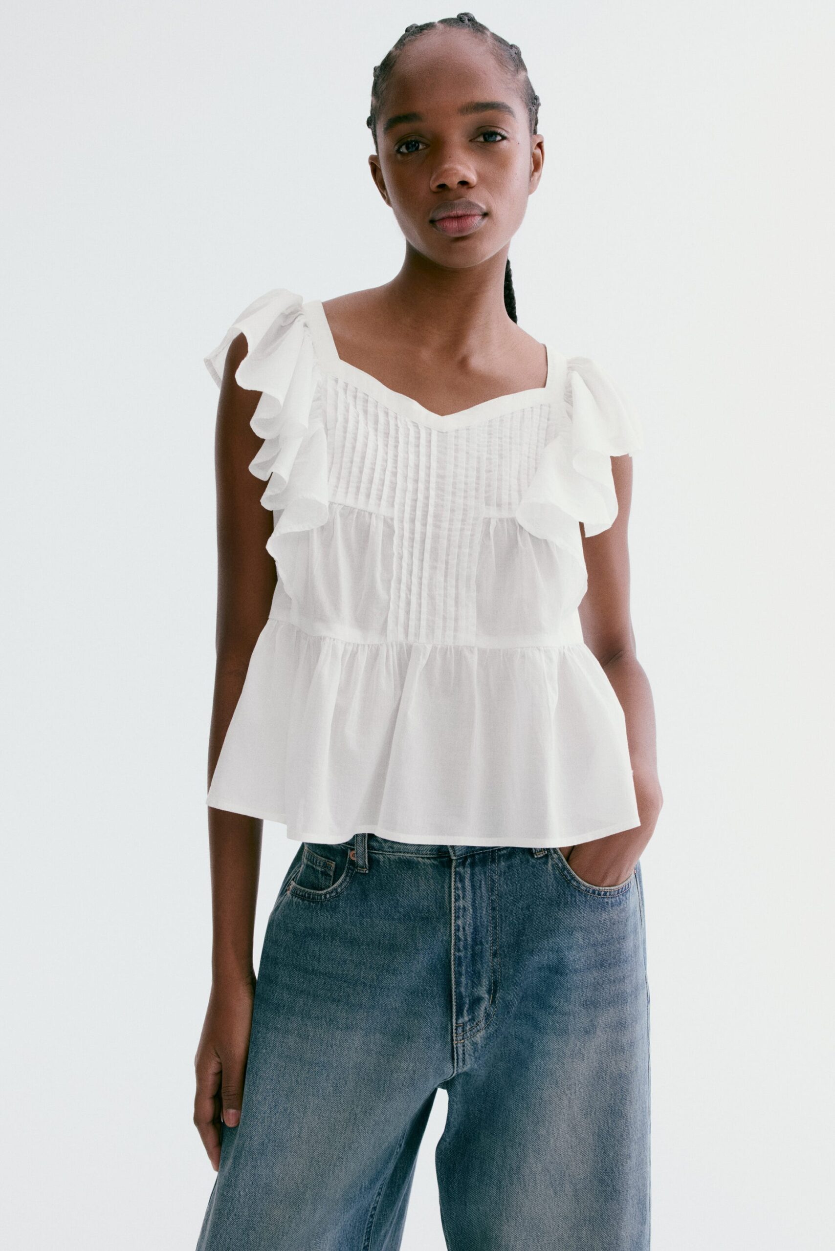 White frill-trimmed cotton top from H&M AED 70