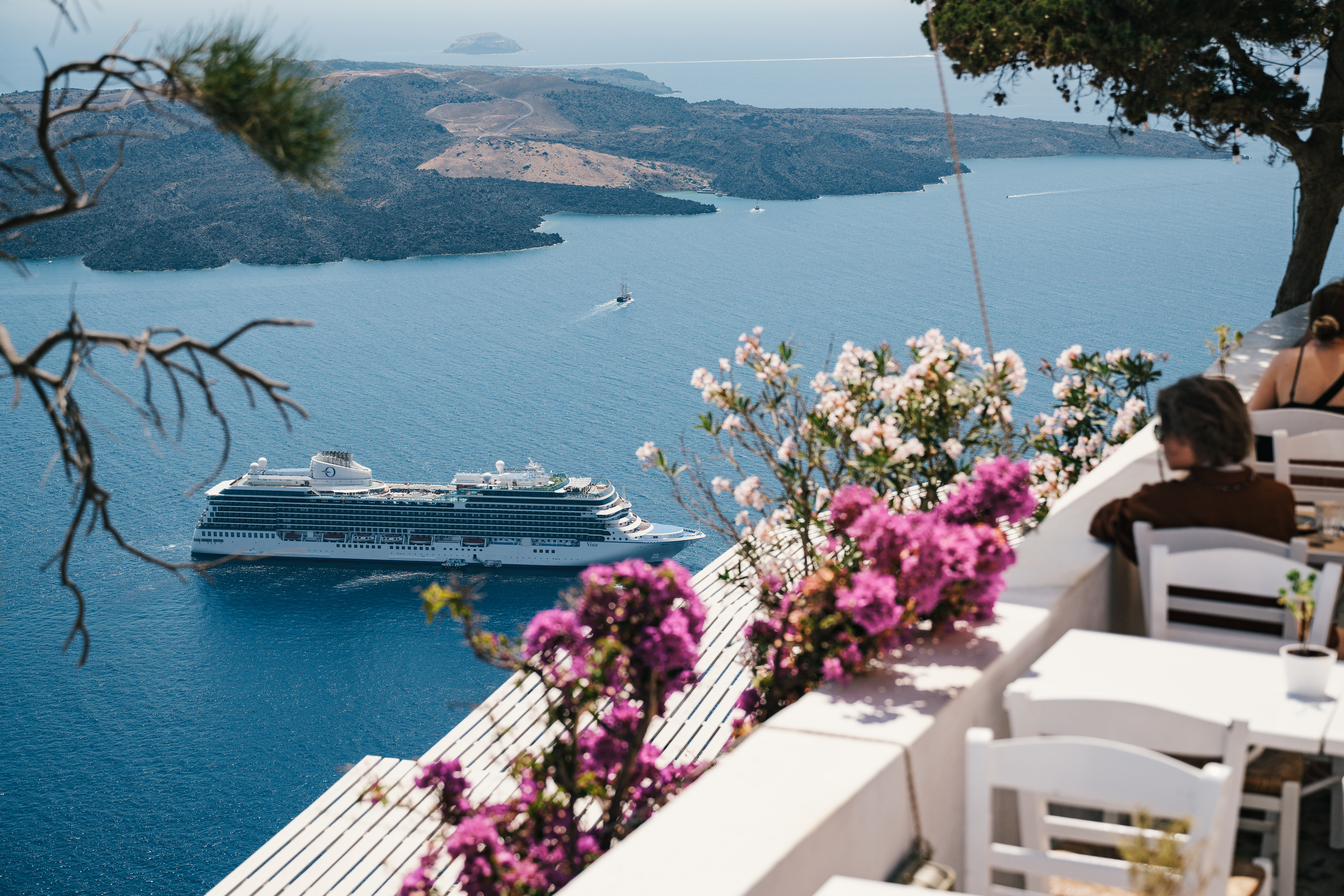 Oceania Cruises ship sailing near Santorini Greece