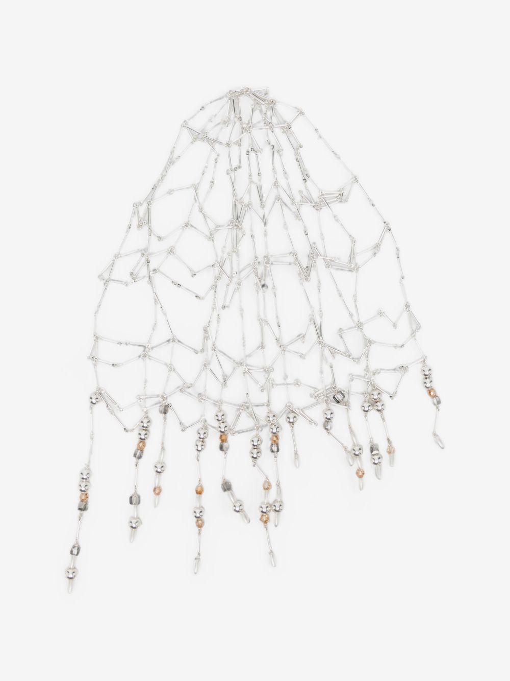 Detail of Rabanne pearl headpiece for Dubai evening dressing