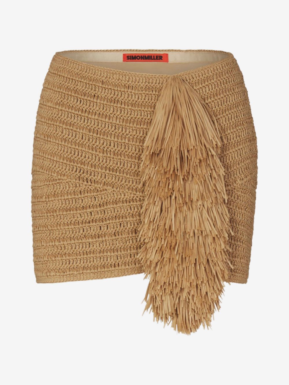 Simon Miller Pom Pom mini skirt for Dubai resort fashion