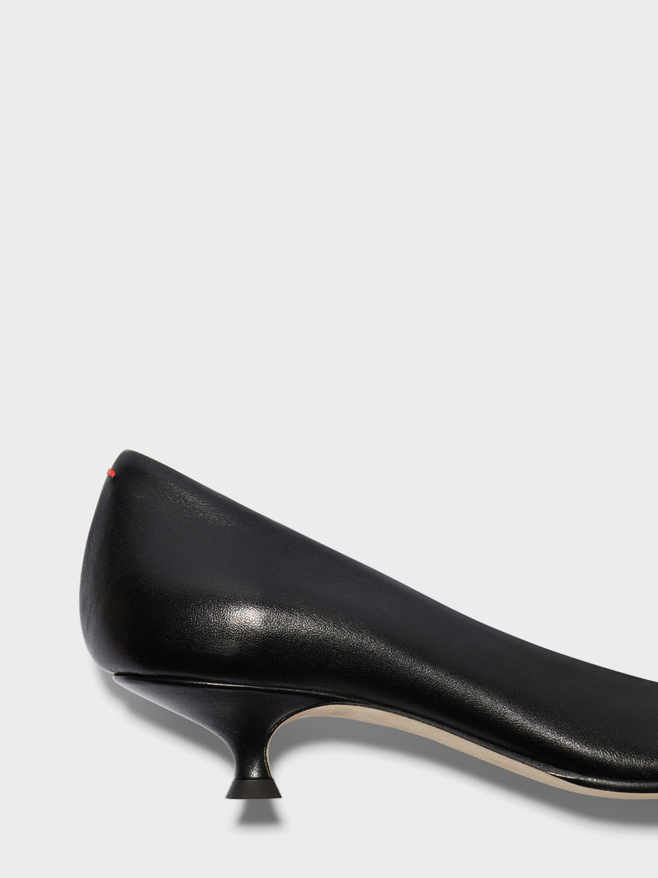 AEYDE Cari Point-Toe Pumps — product and styling photograph 4